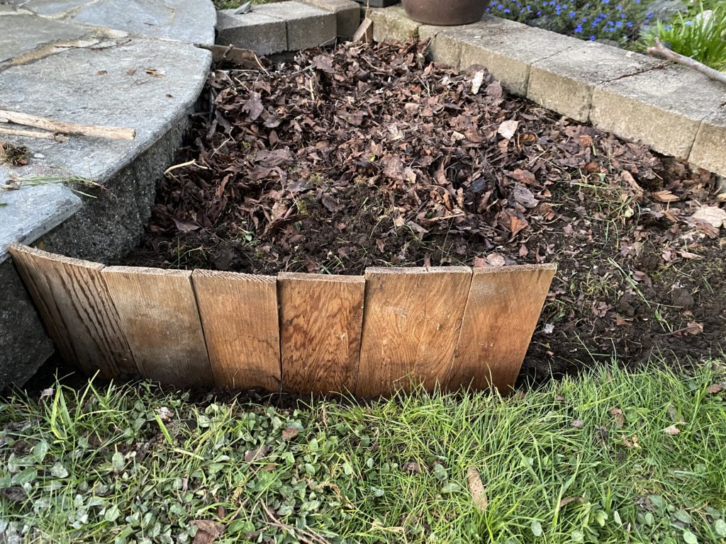 building a retaining wall with scrap wood